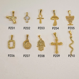 Collection of 24K gold-plated stainless steel pendants including cross, snake, and mushroom
