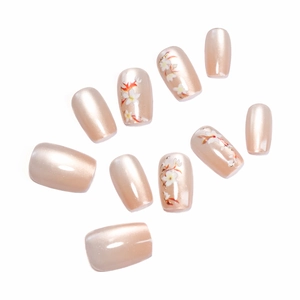 Faux ongles œil de chat nude avec motifs de fleurs rouges, forme carrée
