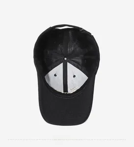 Detail view of cotton baseball cap interior featuring reinforced stitching and embroidery