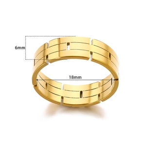 Detail shot of a 6mm gold hollow rectangular geometric chain ring in stainless steel
