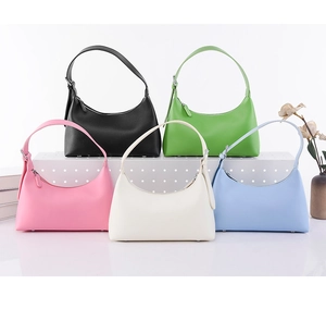 Detailed view of the sleek hobo bags in five trendy colors with silver hardware details