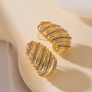 Elegant 18K gold-plated textured geometric earrings featuring sparkling red zircon accents