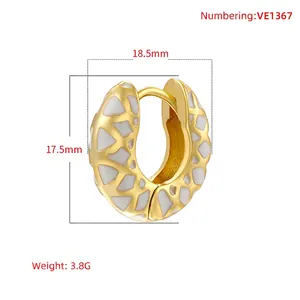 U-shaped gold plated enamel hoop earrings with white geometric pattern 18.5x17.5mm