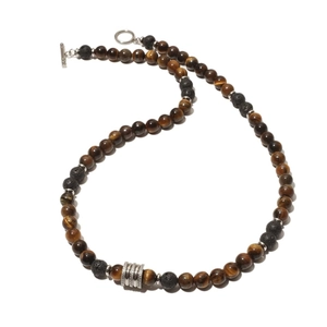 Detail showing 8mm tiger eye and lava stone beads with silver OT clasp closure