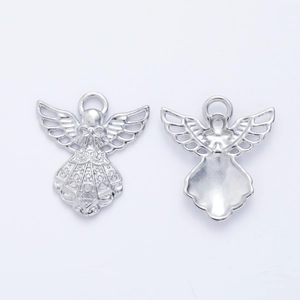 Vintage silver angel charm pendant showing front and back views on white background