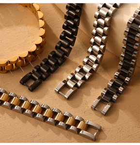 Polished metal link bracelets in gold and silver, featuring a classic watch-style design