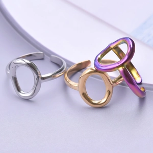 Adjustable organic geometric stainless steel rings in silver, gold, and iridescent finish