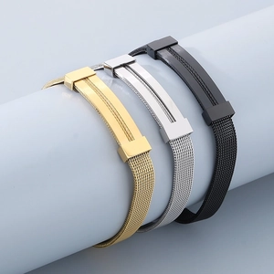 Detailed view of mesh bracelet straps in gold, silver and black stainless steel