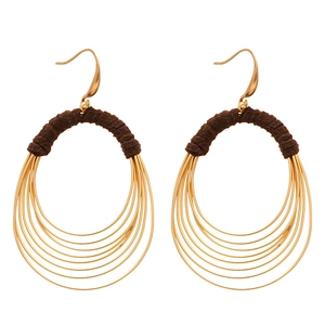 Exaggerated layered circular metal drop earrings with brown fabric wrap and gold hooks