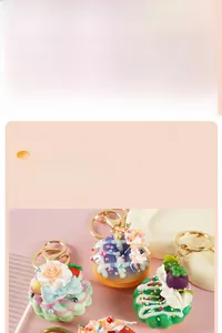 Detail of colorful macaron donut keychains with miniature fruit and pearl decorations
