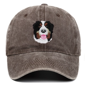 Close-up of a Bernese Mountain Dog embroidery on a washed canvas baseball cap front
