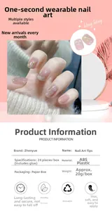 Detailed view of pink french press-on nails with bow designs and shell foil textures