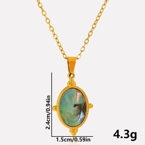 Macro detail of oval abalone shell pendant with 2.4cm height and 1.5cm width dimensions