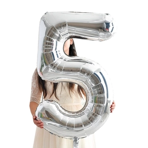 40-inch silver number 5 foil balloon held for birthday and party decorations