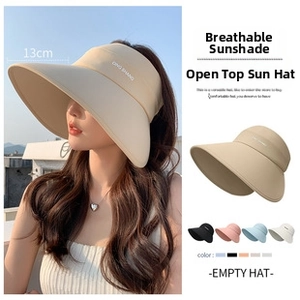 Close-up of 13cm wide brim sun hat with QING SHANG embroidery and beige corduroy texture