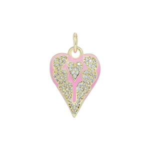 Detailed macro view of pink enamel heart pendant with gold wings and zircon accents