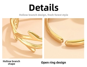 Macro detail of gold adjustable ring featuring a hollow branch and leaf design