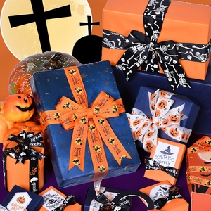 Halloween ribbon rolls and gift boxes with orange pumpkin and spooky witch prints