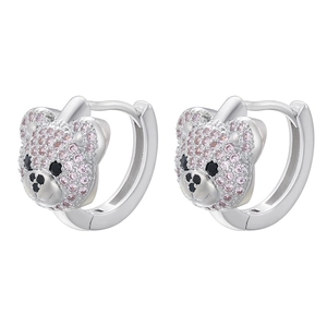 Close-up of teddy bear earrings with pink cubic zirconia and black gemstone eyes