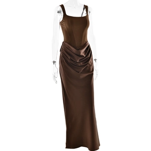 Detail of elegant square neck brown satin dress with waist pleats on mannequin