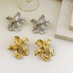 Vintage style 18k gold plated floral stud earrings with detailed textured metal petals