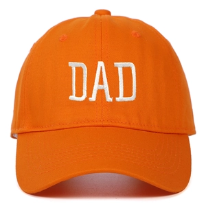 Detailed view of white DAD embroidery on a soft orange cotton baseball cap crown