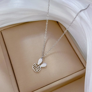 Silver rabbit pendant necklace with hollowed Fu character in an elegant beige gift box