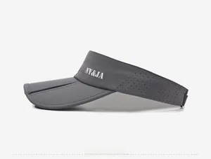 Side view of dark grey sun visor featuring breathable laser-cut holes and white text