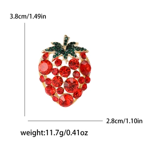 Sparkling red strawberry brooch pin with green rhinestones and exact size dimensions