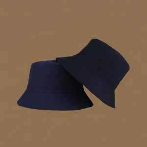 Detail view of foldable navy blue cotton sun hat with wide brim for UV protection