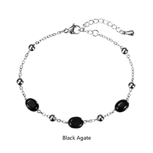 Classic stainless steel chain bracelet featuring black agate stones and round metal beads