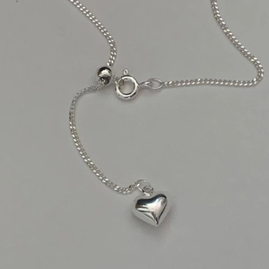 Elegant 925 sterling silver heart pendant necklace with adjustable chain and spring clasp