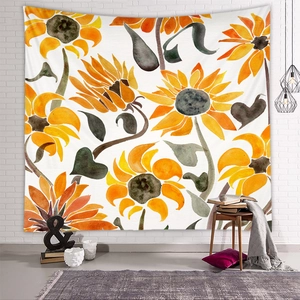 Detail of floral tapestry with watercolor sunflowers on a white brick wall in a bedroom