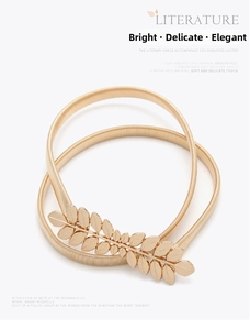 Detail of elegant gold leaf buckle on elastic metal waist chain for summer dresses