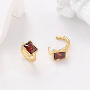 Detailed close-up of 304 stainless steel earrings with red rectangular crystal inlays