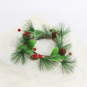 Christmas pine needle and red berry candle ring wreath with natural pinecones