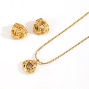 Minimalist gold knot jewelry set with a snake chain necklace and stud earrings