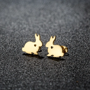 Cute golden rabbit stud earrings made of stainless steel with hollow heart detail