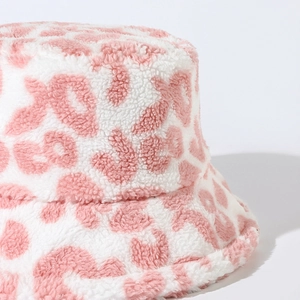 Pink and white leopard print faux lamb wool bucket hat with warm plush texture for winter