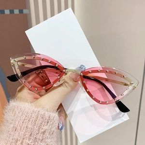 Lunettes de soleil œil de chat sans monture avec verres dégradés roses et strass argentés