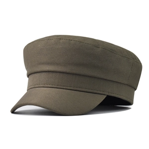 Detailed view of dark olive green cotton canvas flat top cap with visible seam stitching