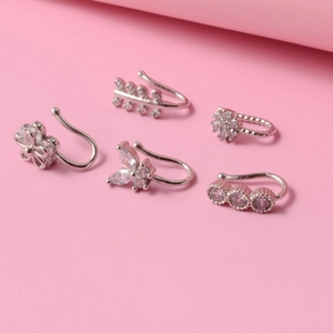 Five-piece set of silver copper faux nose rings with flower, leaf and heart designs