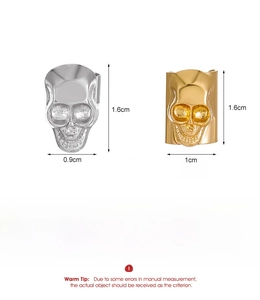 Detailed product dimensions for gothic skull ear clips in silver and gold alloy finish