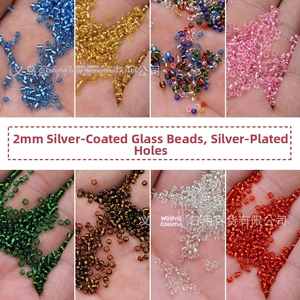 Macro shot of 2mm silver-lined glass seed beads in multiple colors for DIY jewelry making