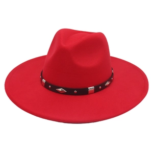 Detail view of red fedora hat with black leather belt and diamond metal buckle