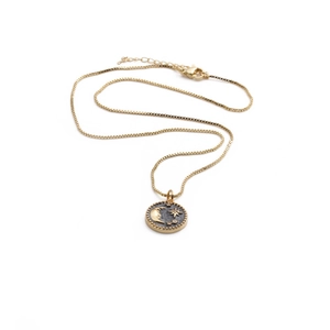 Detailed view of gold plated crescent moon and star pendant on a classic box chain