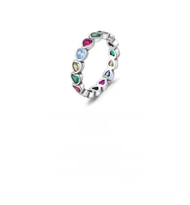 Macro view of S925 sterling silver ring featuring multi-colored heart-shaped gemstones