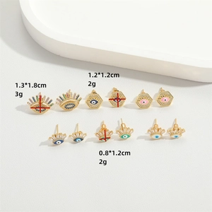 Evil eye stud earrings set with crystal inlay in varied colors and gold finish