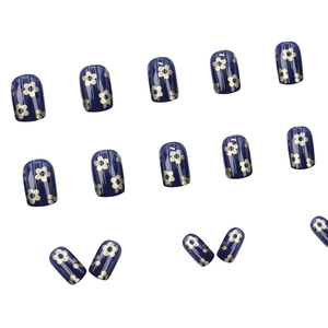 Short square navy blue matte press-on nails with elegant gold flower patterns