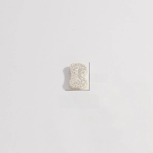 Macro detail of S925 silver letter B charm with zircon pavé, 8.8mm height and 2.3mm hole